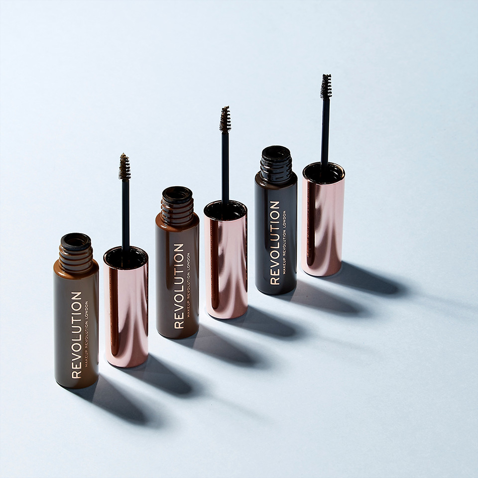 An image of the Revolution Brow Gel in ash brown, medium brown and dark brown